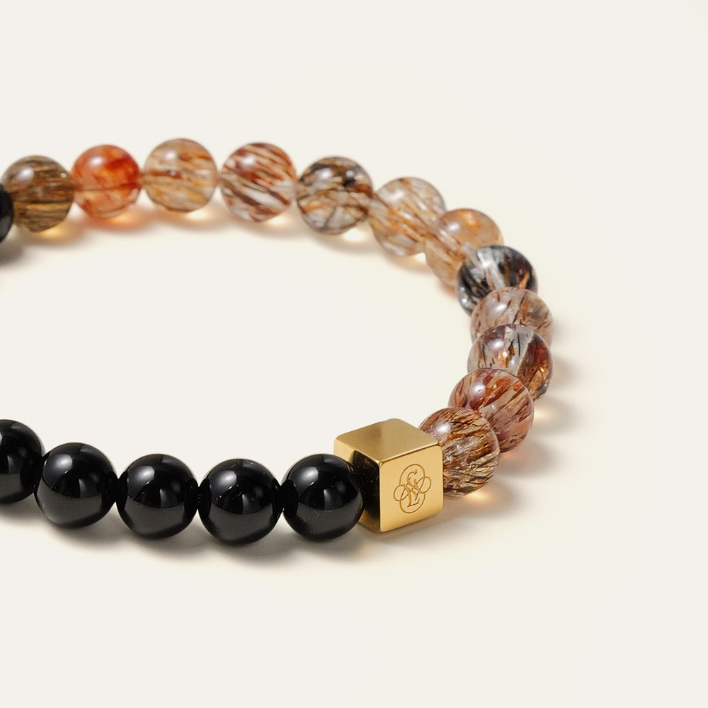 8mm natural Black Gold Super Seven and Obsidian beaded split bracelet with a 14K gold PVD square signature bead. This is a natural gemstone and healing crystal bracelet by Soul Lykke.