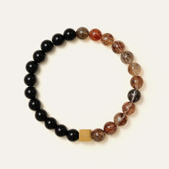 8mm natural Black Gold Super Seven and Obsidian beaded split bracelet with a 14K gold PVD square signature bead. This is a natural gemstone and healing crystal bracelet by Soul Lykke.