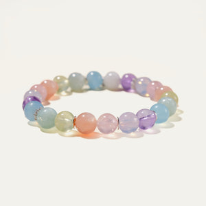 Macro view of the serene pastel gemstone gradient, highlighting a 316L surgical steel signature tag finished in white gold PVD. This harmonious combination of natural crystals provides an energetic reset to soothe stress and balance emotion.