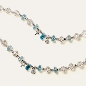 Macro shot revealing the pure clarity and light reflection of AAA grade faceted natural Clear Quartz beads.