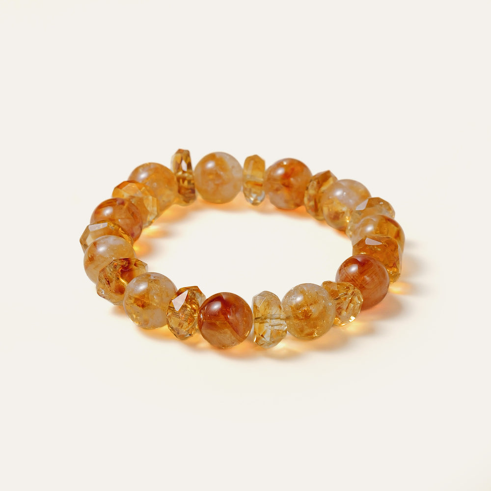 Bold 12mm natural Golden Phantom Citrine beaded bracelet featuring distinct pyramid inclusions and the engraved Soul Lykke signature tag. This is a natural gemstone and healing crystal bracelet by Soul Lykke.