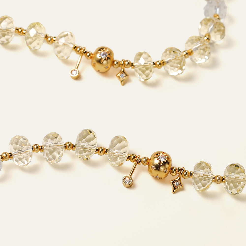 Close-up of the bracelet's adjustable 24K gold-plated sterling silver chain and faceted natural Citrine beads. This is a natural gemstone and healing crystal bracelet by Soul Lykke.