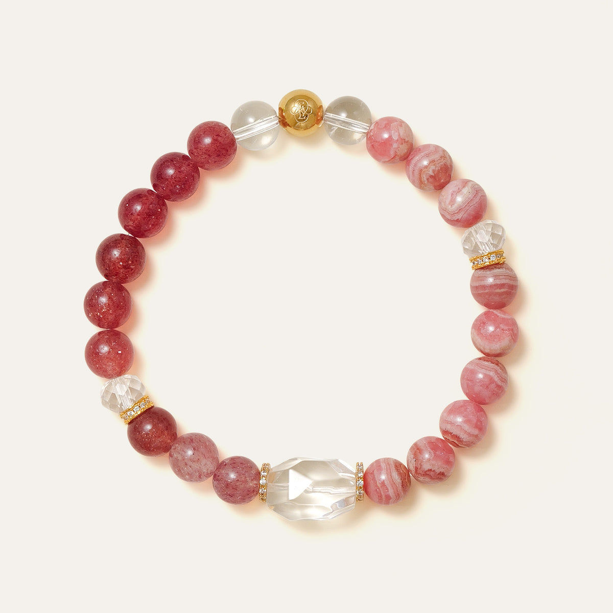 Elegant beaded bracelet combining 8mm natural Lace Rhodochrosite, Star Strawberry Quartz, and a faceted Clear Quartz centerpiece, featuring the Soul Lykke signature gold bead. This is a natural gemstone and healing crystal bracelet by Soul Lykke.
