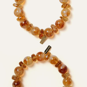 Macro shot highlighting the striking clarity and natural growth patterns of AAA-grade Golden Phantom Citrine with the Soul Lykke signature tag.