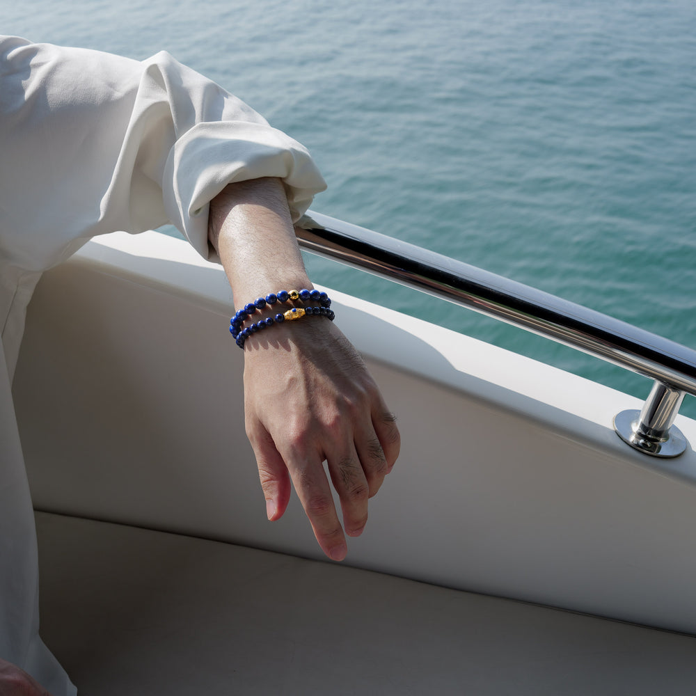 The Core Essential 8mm pure Lapis Lazuli bracelet by Soul Lykke. Crafted from collector-level AAA-grade stones from historic Afghan mines, this luxury crystal jewelry features a deeply saturated royal blue expanse. This is a natural gemstone bracelet by Soul Lykke.