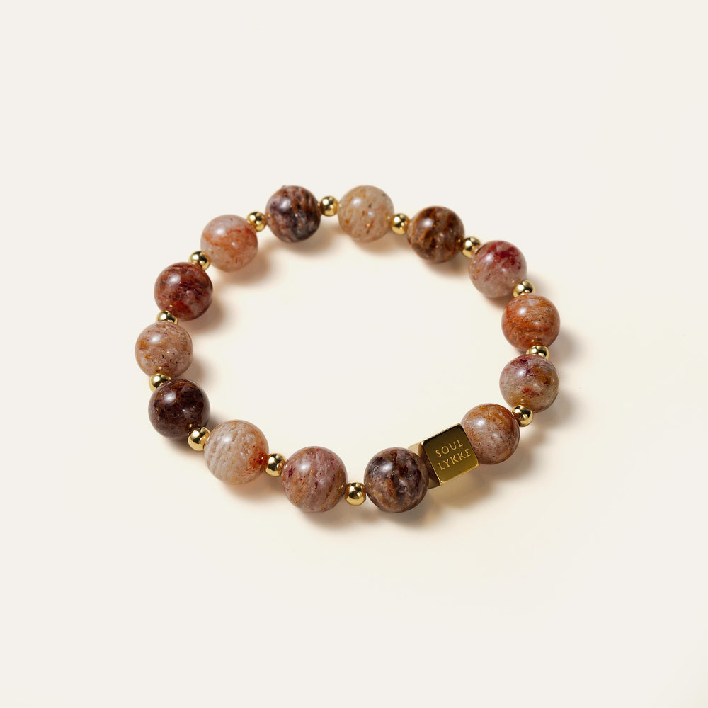 Stunning 10mm natural multi-color layered Phantom Quartz bracelet featuring the Soul Lykke signature 14K gold square bead. This is a natural gemstone and healing crystal bracelet by Soul Lykke.