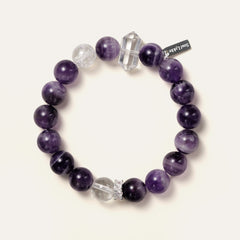 Lucid Dreamer bracelet featuring 10.5mm Dream Chevron Amethyst, a double-terminated clear quartz point, and the Soul Lykke signature white gold PVD tag. This is a natural gemstone and healing crystal bracelet by Soul Lykke.