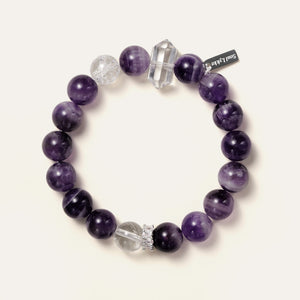 Lucid Dreamer bracelet featuring 10.5mm Dream Chevron Amethyst, a double-terminated clear quartz point, and the Soul Lykke signature white gold PVD tag. This is a natural gemstone and healing crystal bracelet by Soul Lykke.
