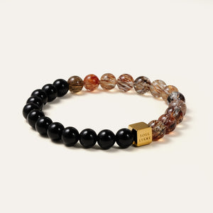 Half Obsidian and half Black Gold Super Seven crystal bracelet featuring a Soul Lykke engraved gold square bead.
