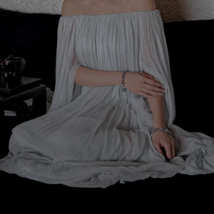 Elegant styling of premium Labradorite crystal jewelry worn by a model, capturing the peaceful energy and timeless design of Soul Lykke.