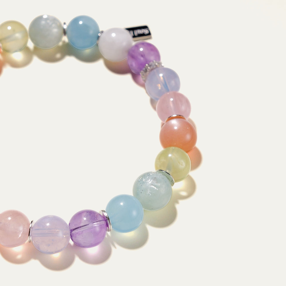 The Monet pastel multi-gemstone bracelet by Soul Lykke. A serene watercolor-inspired gradient featuring 8mm AAA-grade Hibiscus Rose Quartz, Teal Lepidolite, Aquamarine, and Lavender Amethyst on a seamless background. This is a healing crystal bracelet by Soul Lykke.